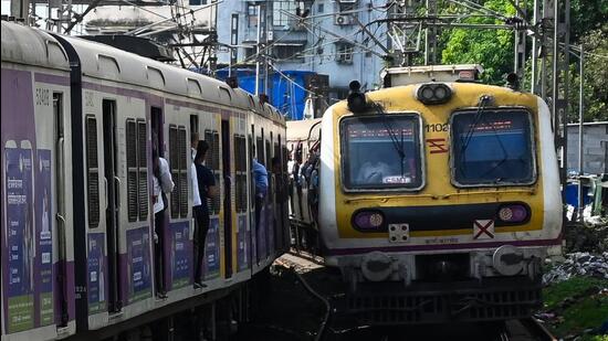 Thane India June 10 2025 Local trains cross ne 1749583311896