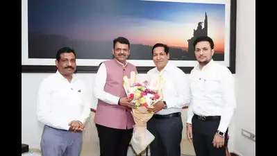 two time airoli mla sandeep naik returns to bjp after year with ncp sp